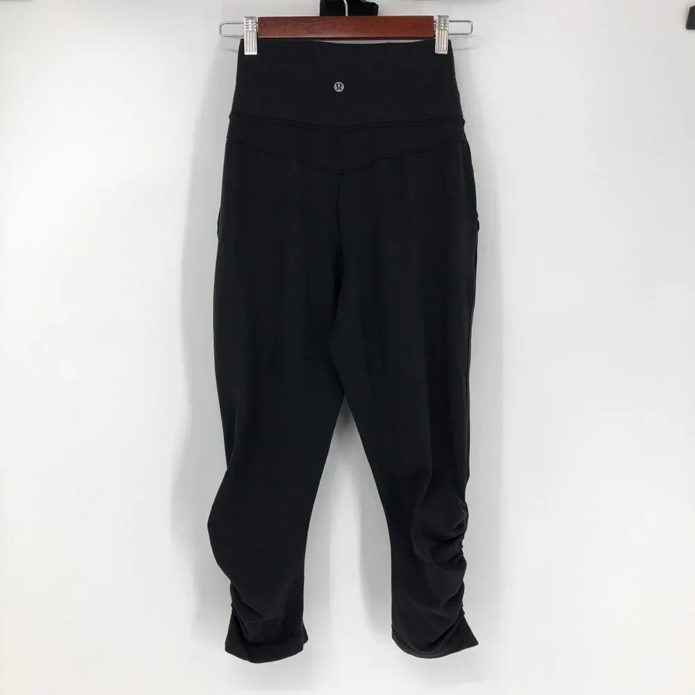 Lululemon Sunset Salutation Cropped leggings loose fit  ruched pockets Black 4 - Picture 15 of 16